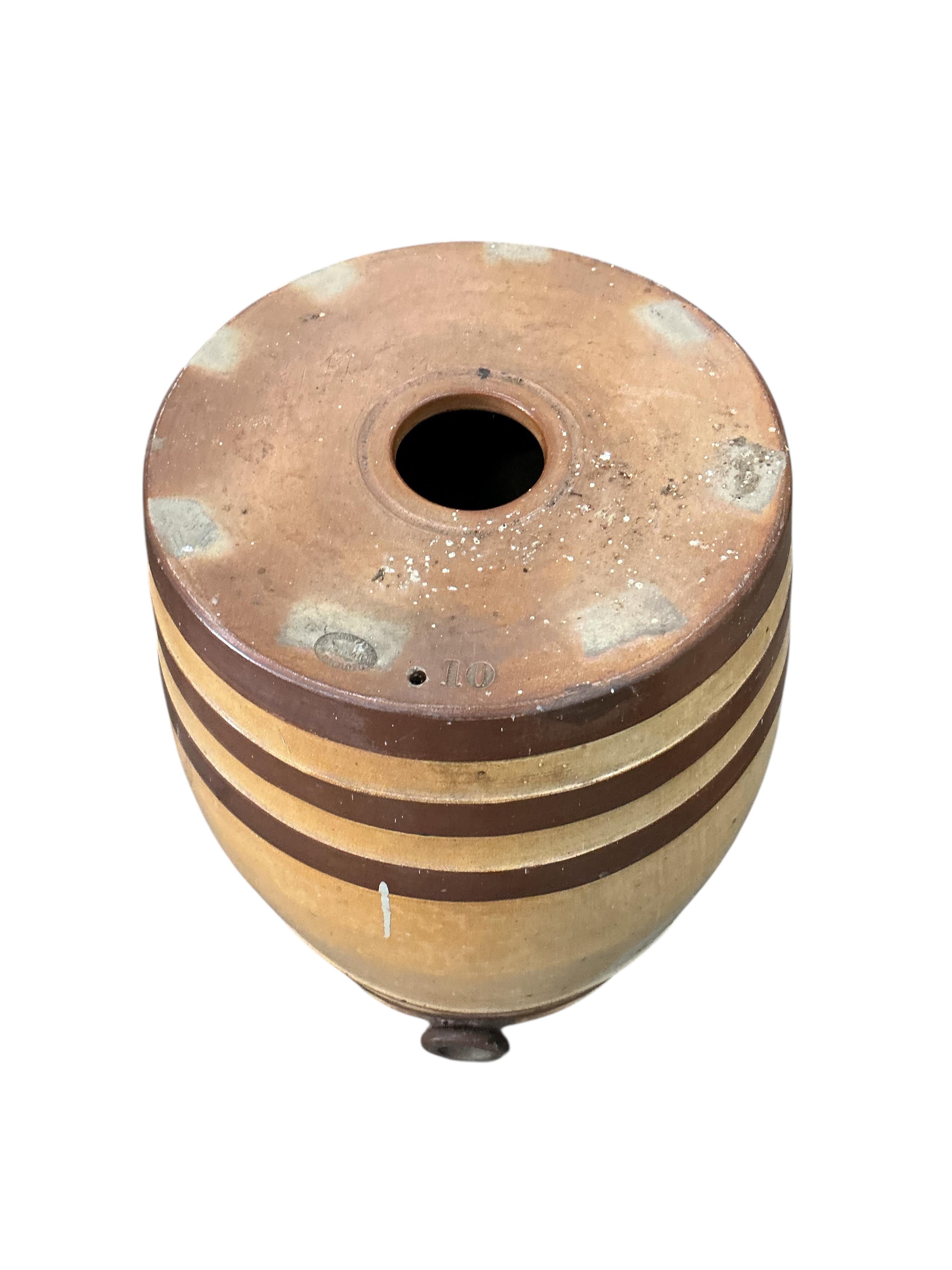 Two Victorian Doulton and Watts salt-glazed stoneware barrels, larger diameter 46cm, height 68cm, Provenance: The late Kenneth Turner (1936-2025), celebrity florist, designer and perfume retailer, he received the Royal W